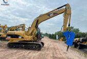 CAT 320CL crawler excavator with hammer