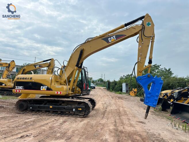 CAT 320CL crawler excavator with hammer