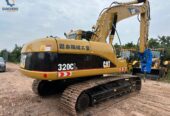 CAT 320CL crawler excavator with hammer
