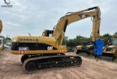 CAT 320CL crawler excavator with hammer