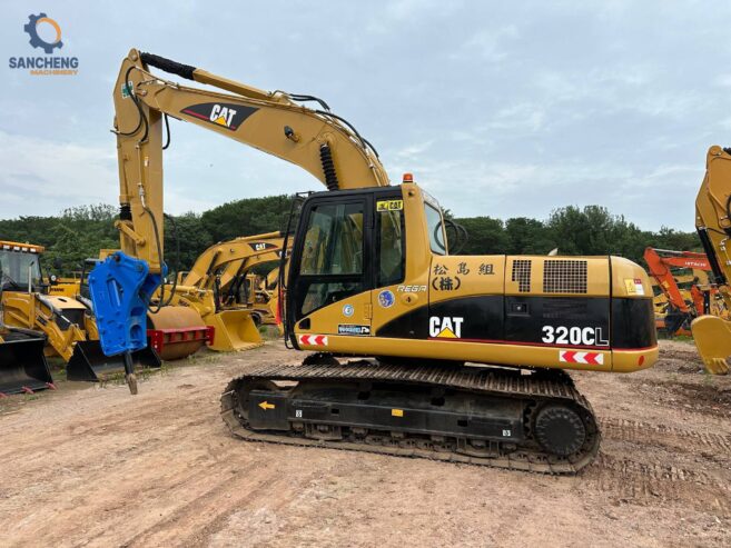 CAT 320CL crawler excavator with hammer