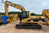 CAT 320CL crawler excavator with hammer