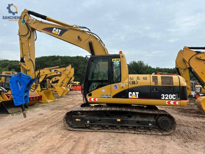 CAT 320CL crawler excavator with hammer